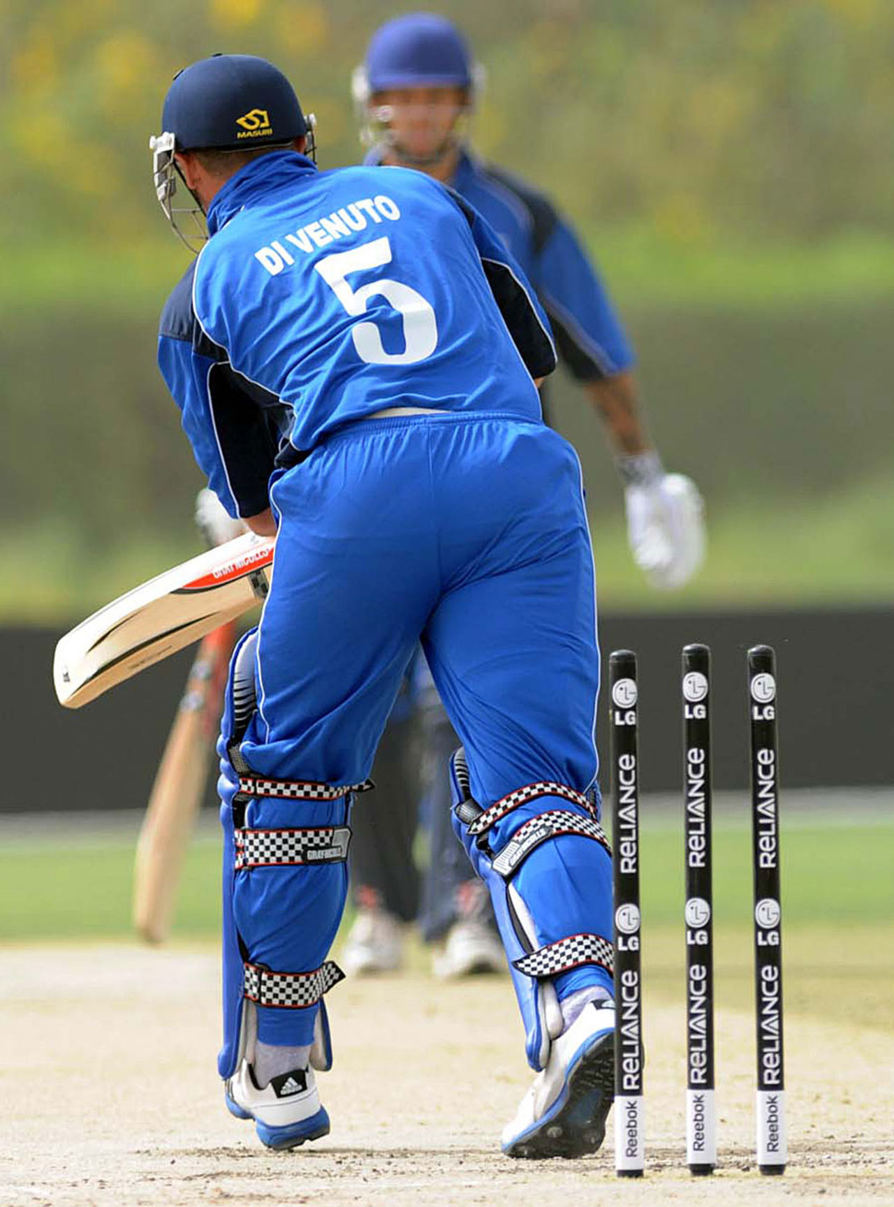 Michael Di Venuto is bowled by Matthew Parker, Italy v Scotland, ICC World Twenty20 Qualifier, Dubai, March 19, 2012