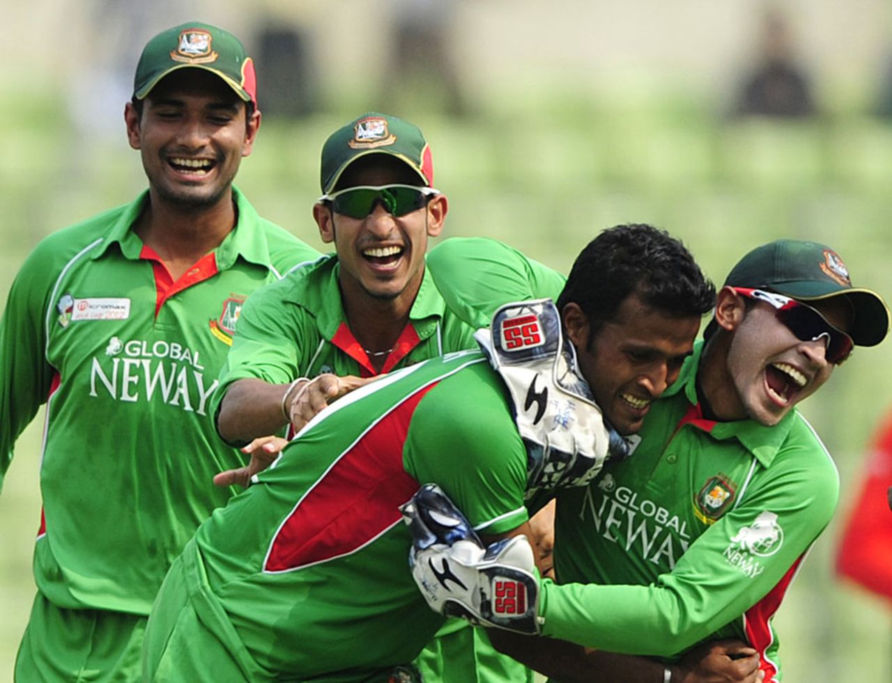Mushfiqur Rahim is delighted with Nazmul Hossain for picking up a wicket, Bangladesh v Sri Lanka, Asia Cup, Mirpur, March 20, 2012