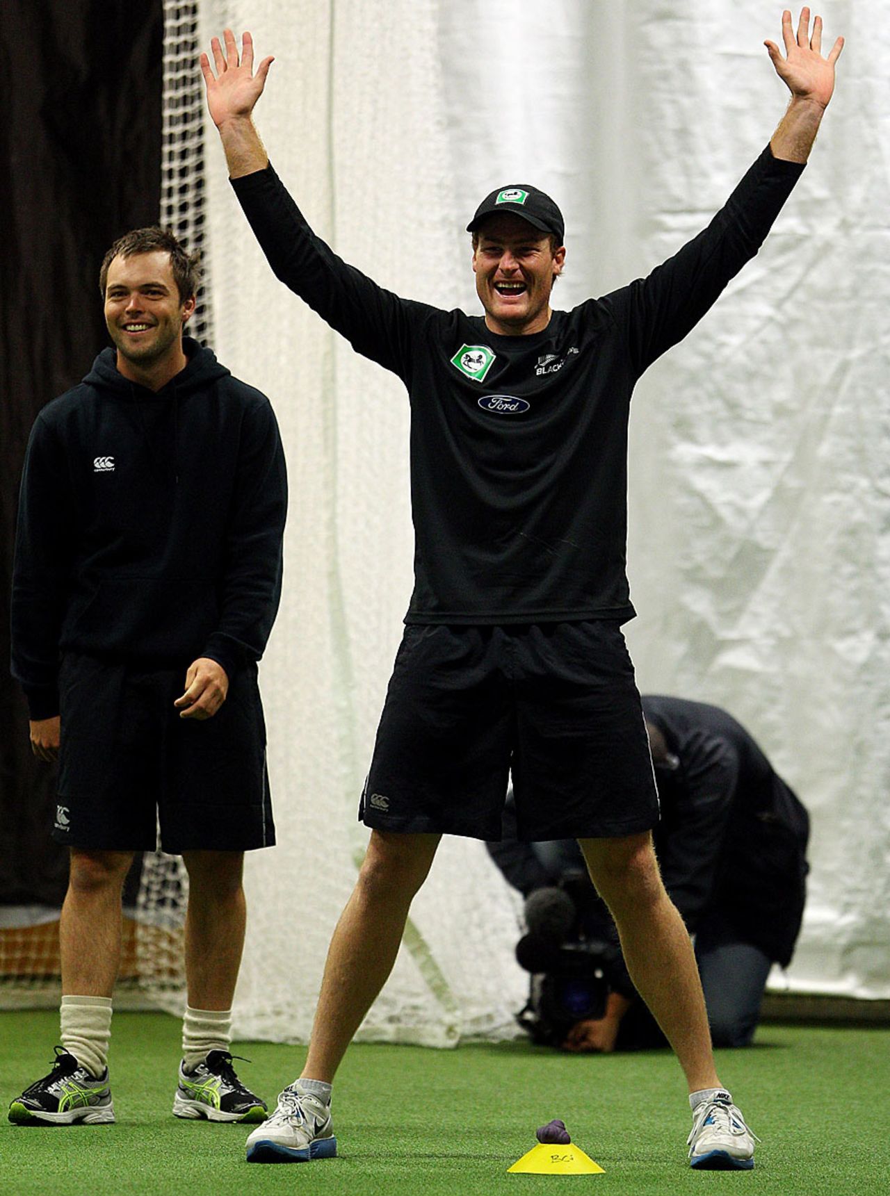 Martin Guptill and Daniel Flynn share a light moment, Wellington, March 22, 2012