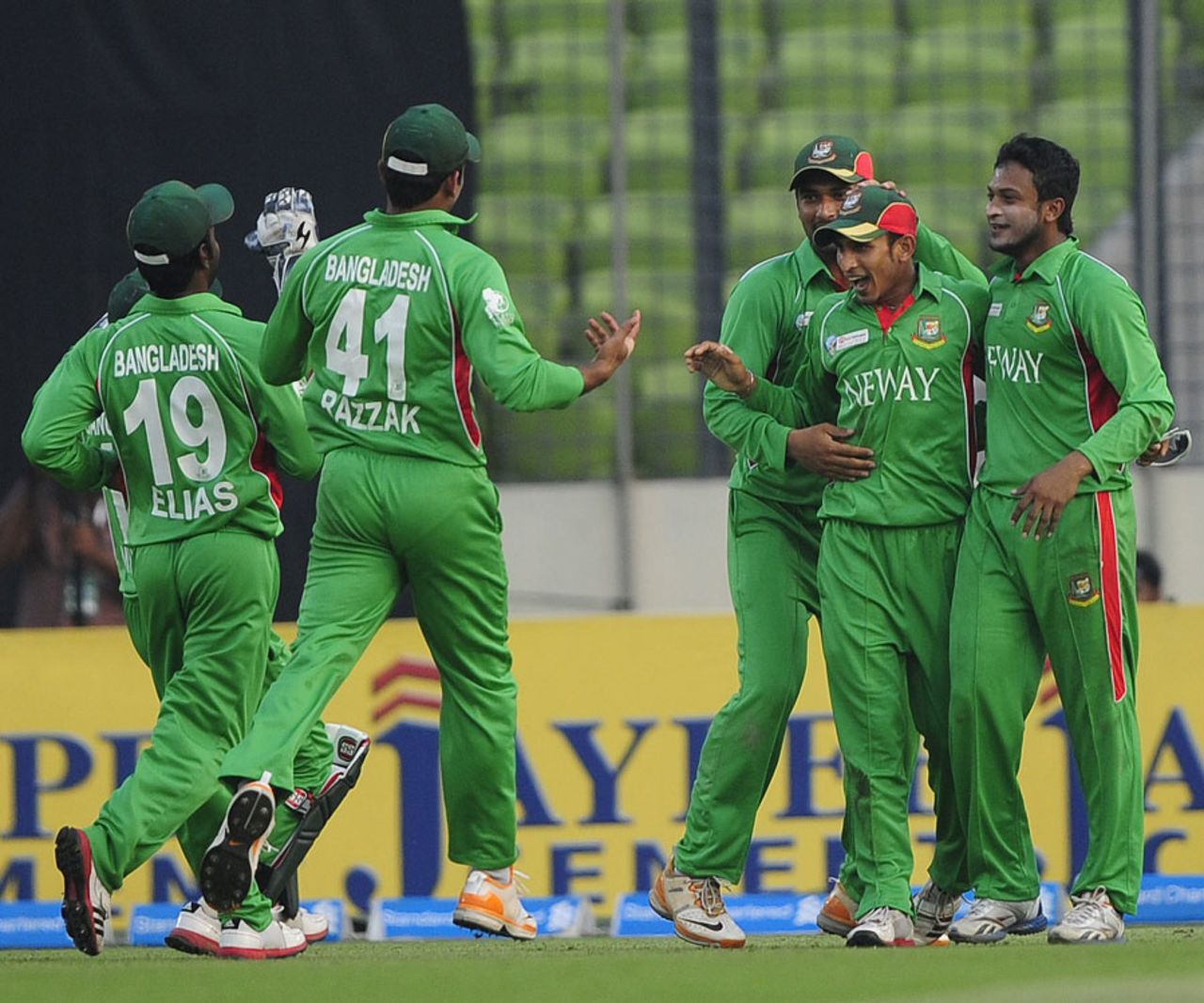 Nasir Hossain is surrounded by team-mates after an impressive catch, Bangladesh v Pakistan, Asia Cup final, Mirpur, March 22, 2012
