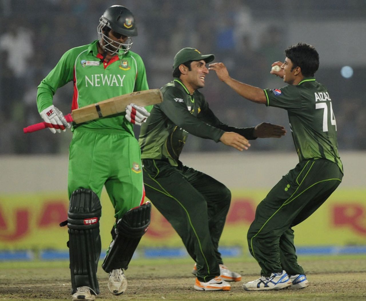 Misbah-ul-Haq and Aizaz Cheema celebrate Pakistan's win, Bangladesh v Pakistan, Asia Cup final, Mirpur, March 22, 2012