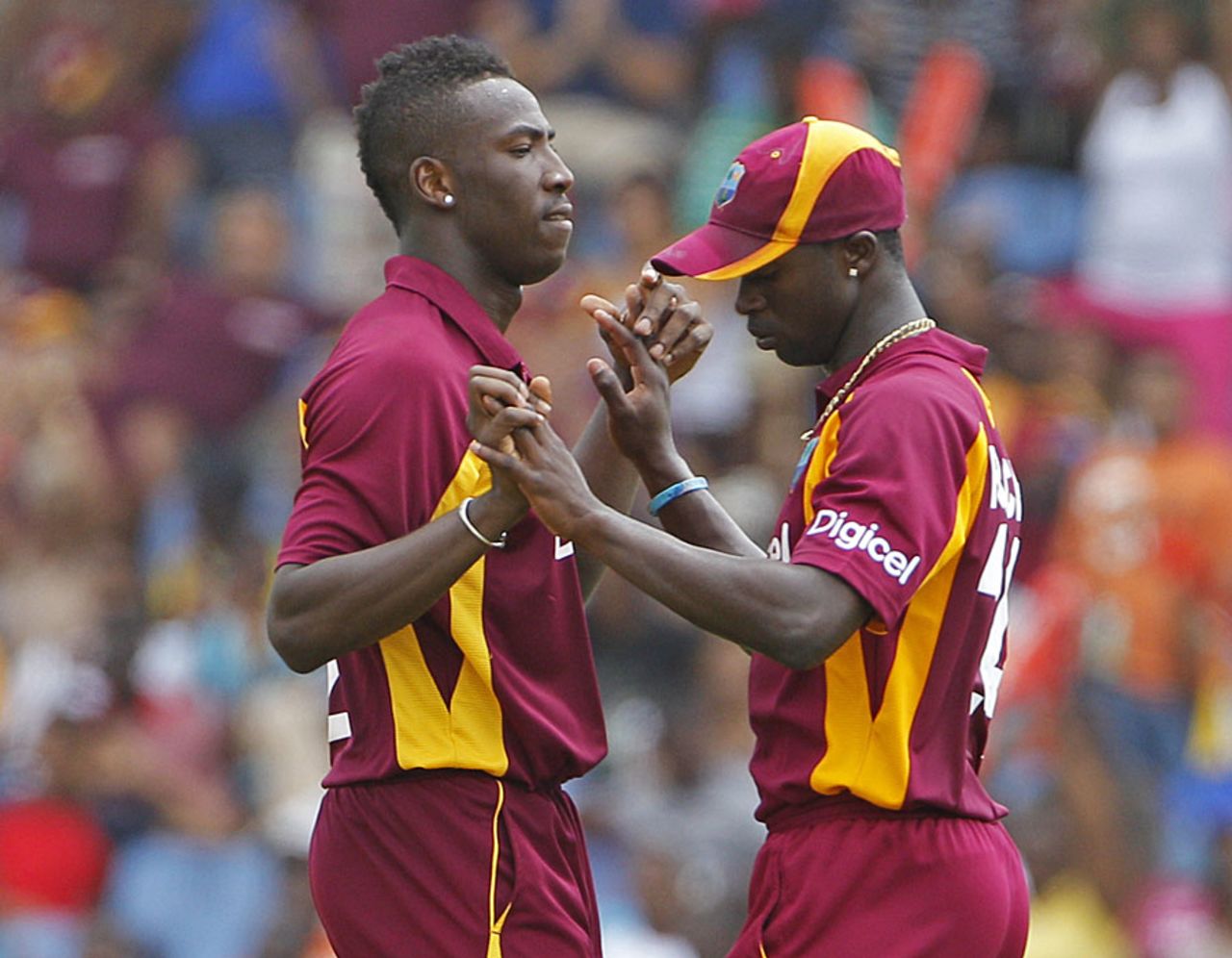 Andre Russell and Kemar Roach celebrate a wicket, West Indies v Australia, Gros Islet, St Lucia, March 25, 2012