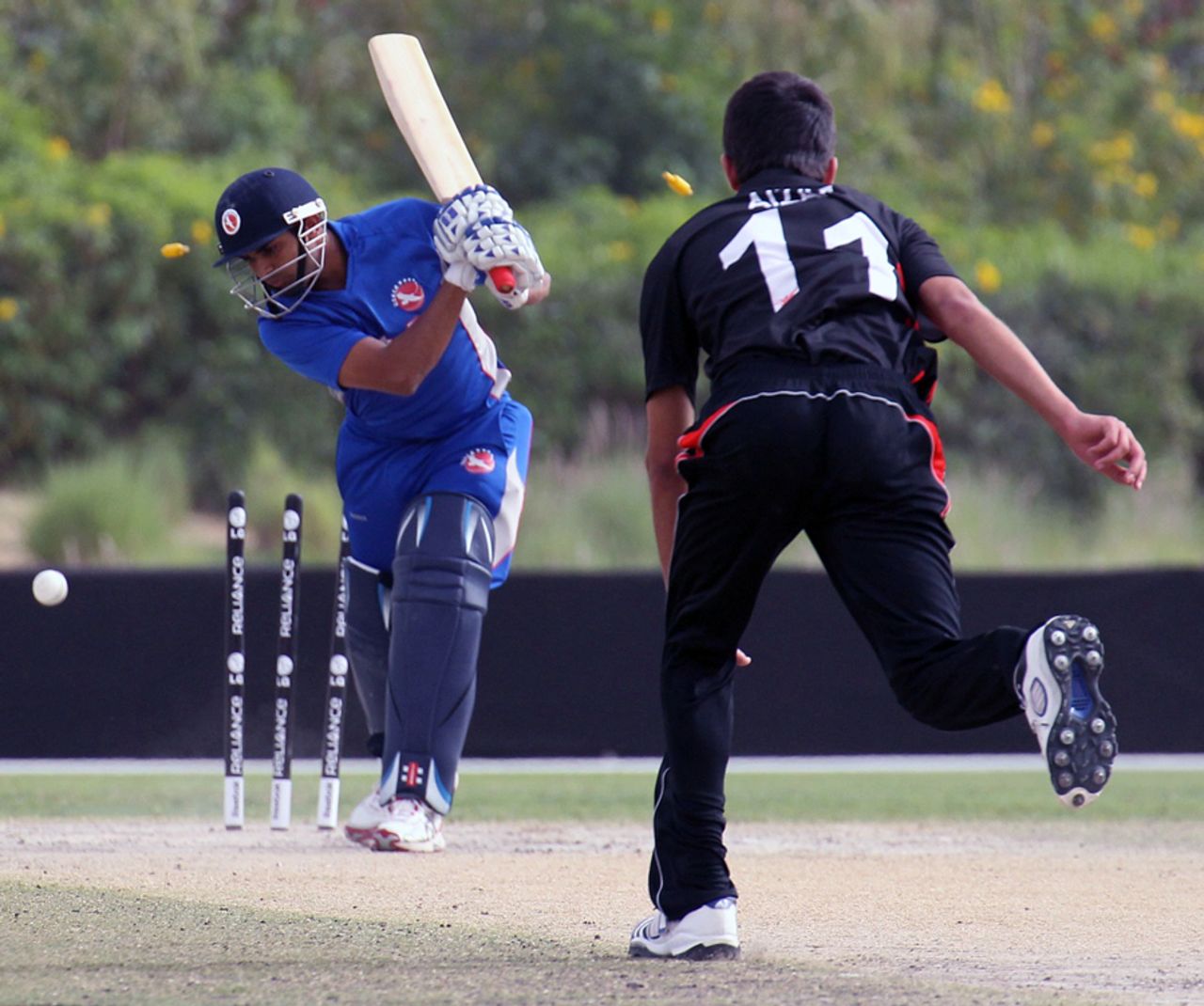 Aizaz Khan cleans up USA's Japen Patel during his spell of 5-25 in the ICC World Twenty20 Qualifier 11th Place Play-off match played at the ICC Global Cricket Academy ground on 23rd March 2012