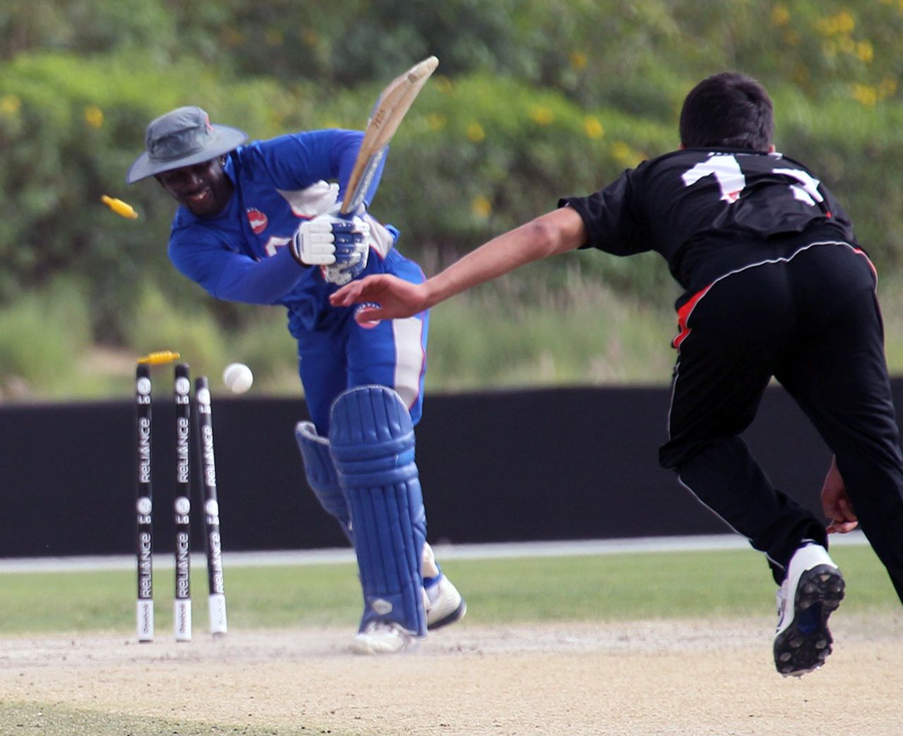 Orlano Baker is clean bowled by Aizaz Khan during the ICC World Twenty20 Qualifier 11th Place Play-off match between USA and Hong Kong played at the ICC Global Cricket Academy ground in Dubai on 23rd March 2012