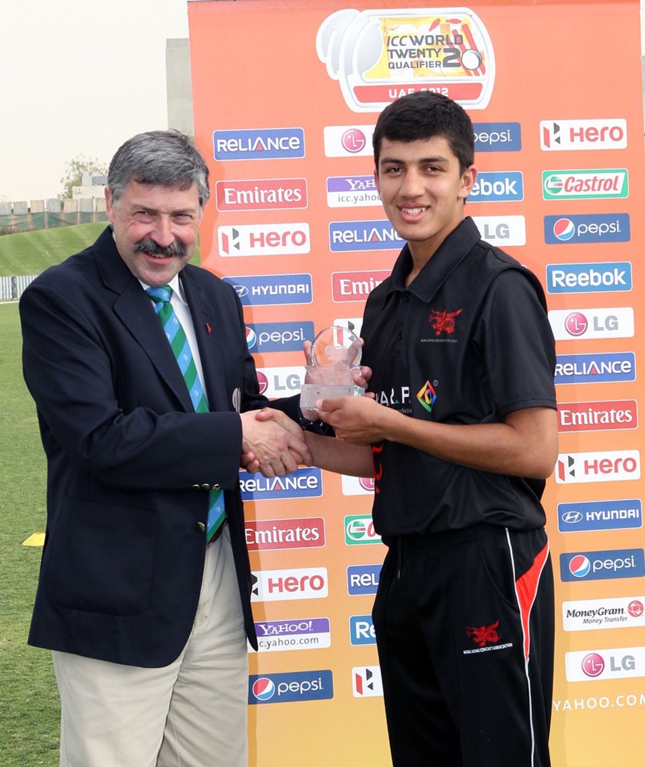 Aizaz Khan collects his Man of the Match Award from Match Referee David Jukes for his spell of 5-25 against USA during the ICC World Twenty20 Qualifier 11th Place Play-off played at the ICC Global Cricket Academy ground in Dubai on 23rd March 2012