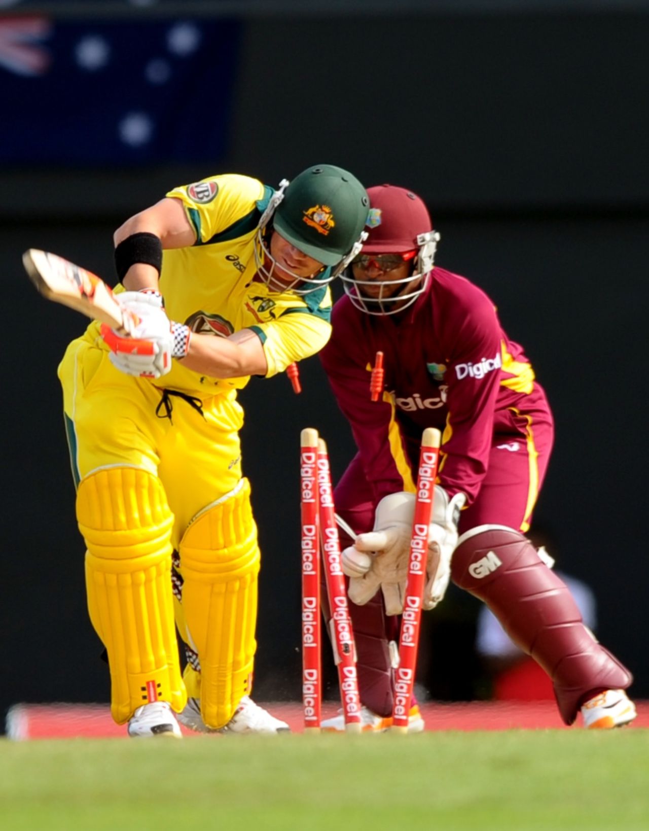 David Warner is bowled by Krishmar Santokie in the first over, West Indies v Australia, 1st Twenty20, St Lucia