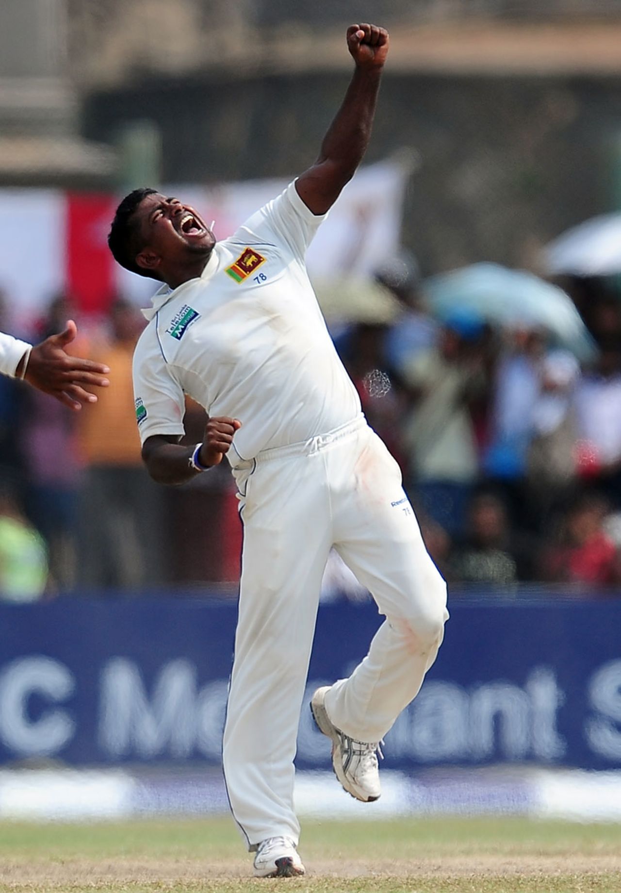 Rangana Herath celebrates his twelfth wicket of the match, trapping Graeme Swann lbw , Sri Lanka v England, 1st Test, Galle, 4th day, March 29, 2012