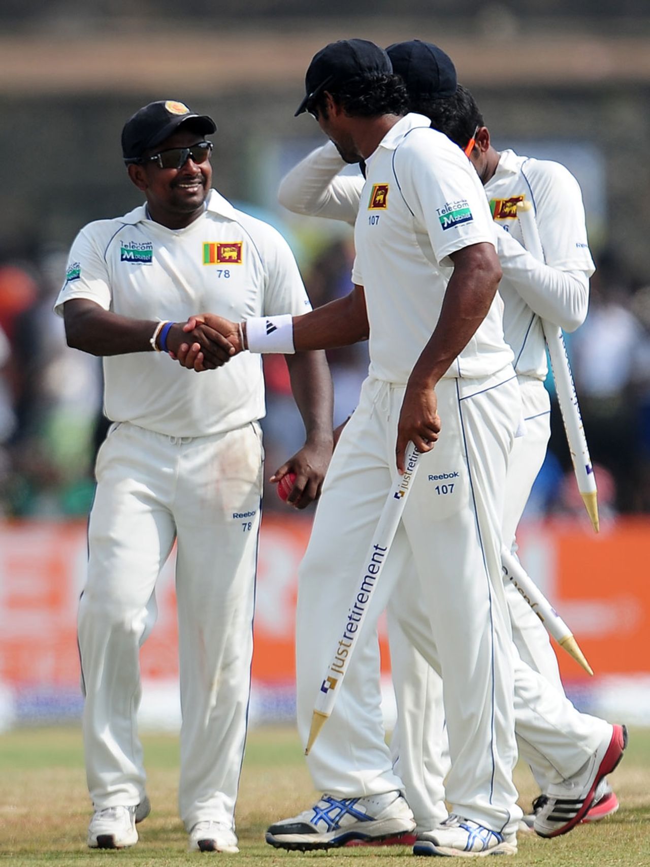 Rangana Herath takes the plaudits for his 12 wickets in the match, Sri Lanka v England, 1st Test, Galle, 4th day, March 29, 2012