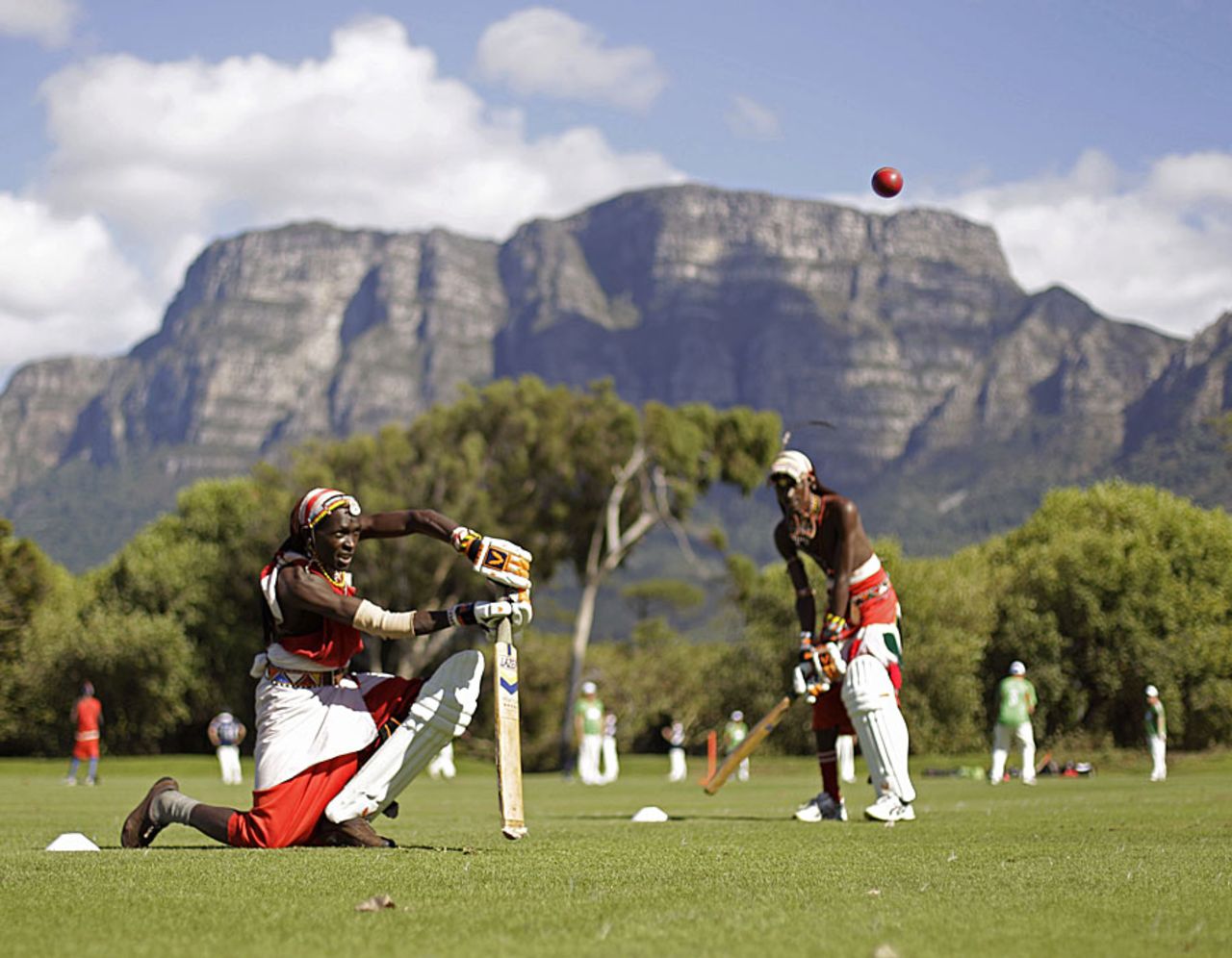 Maasai Warriors from the Laikipia region in Kenya warm up before a game, Cape Town, March 31, 2012