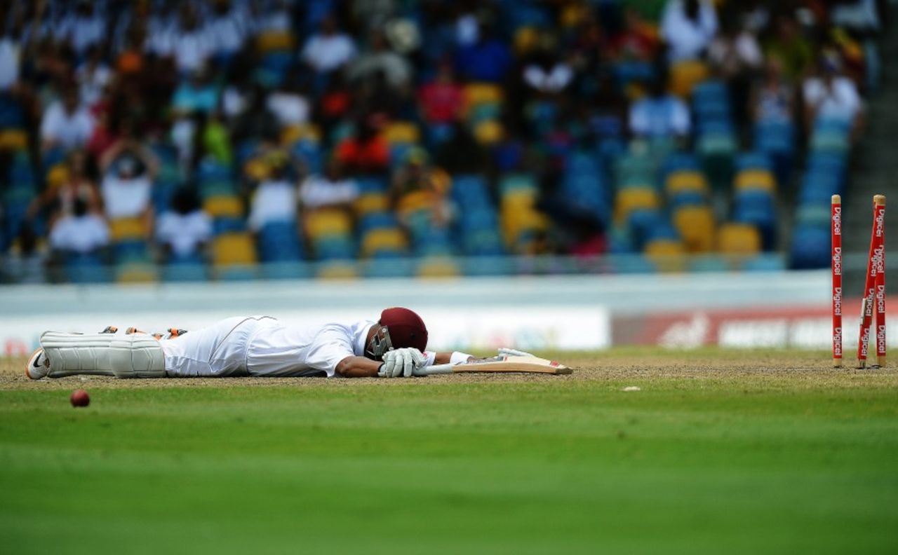Carlton Baugh realises he has been caught short by a direct hit, West Indies v Australia, 1st Test, Barbados, 2nd day, April 8, 2012