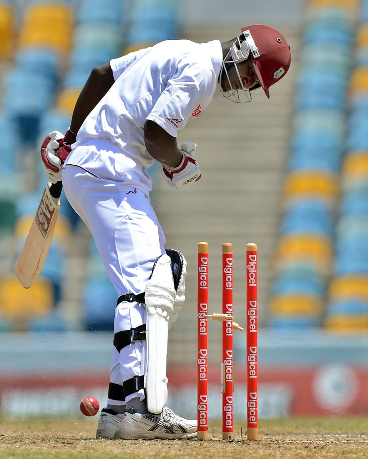 Darren Sammy watches the ball deflect on to his stumps, West Indies v Australia, 1st Test, Barbados, 5th day, April 11, 2012