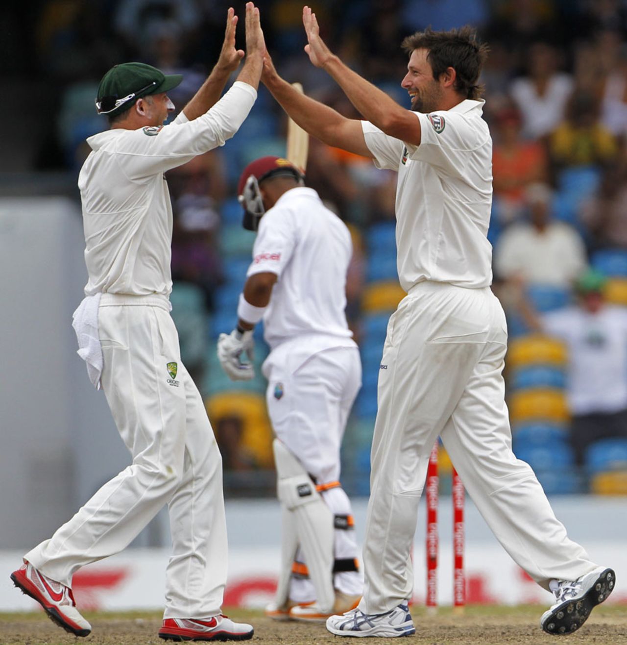 Mike Hussey and Ben Hilfenhaus celebrate the wicket of Carlton Baugh, West Indies v Australia, 1st Test, Barbados, 5th day, April 11, 2012