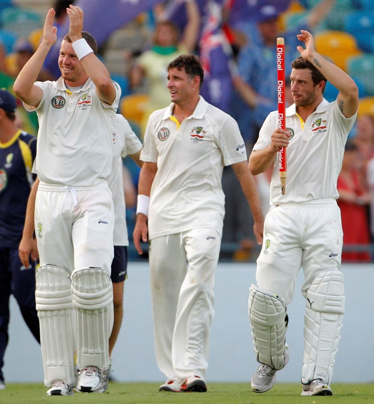 Peter Siddle, Michael Hussey and Matthew Wade acknowledge the crowd after Australia's win, West Indies v Australia, 1st Test, Barbados, 5th day, April 11, 2012