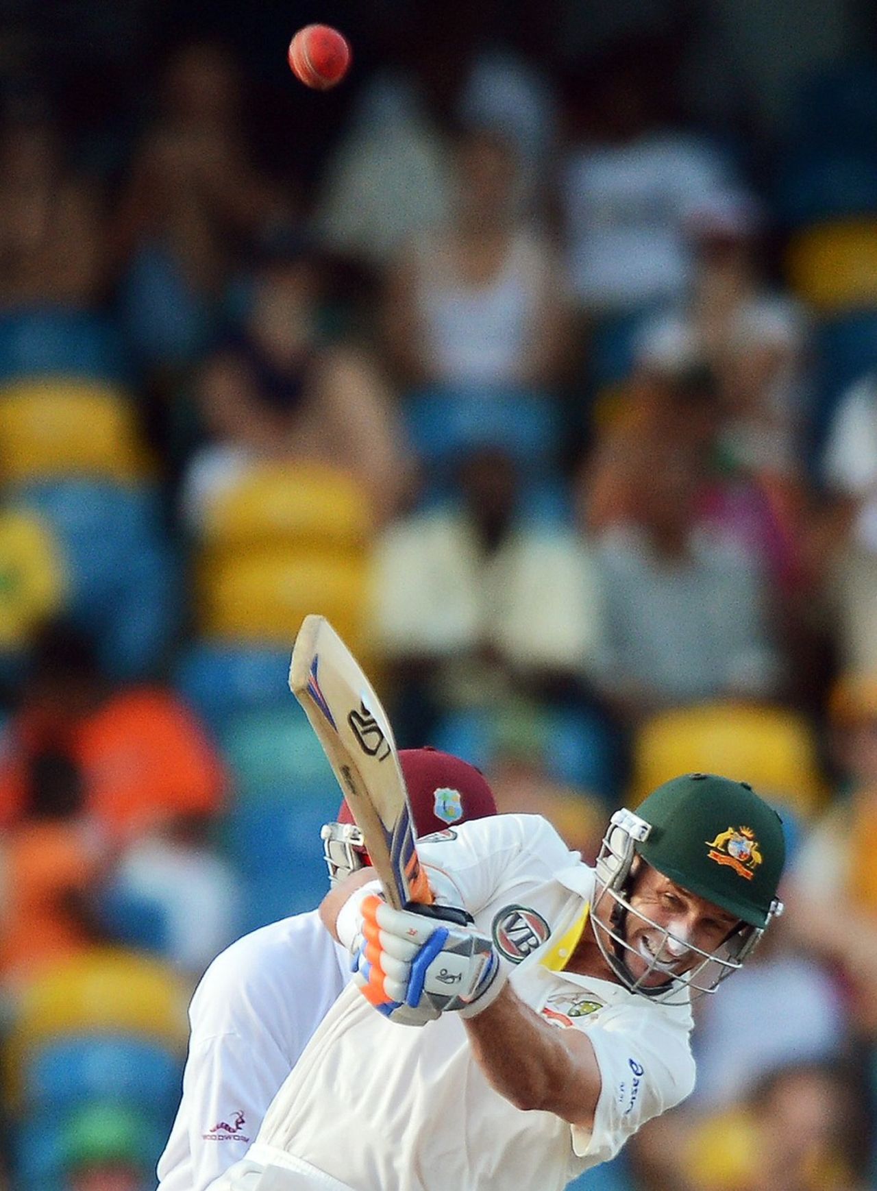 Michael Hussey launches a six down the ground, West Indies v Australia, 1st Test, Barbados, 5th day, April 11, 2012