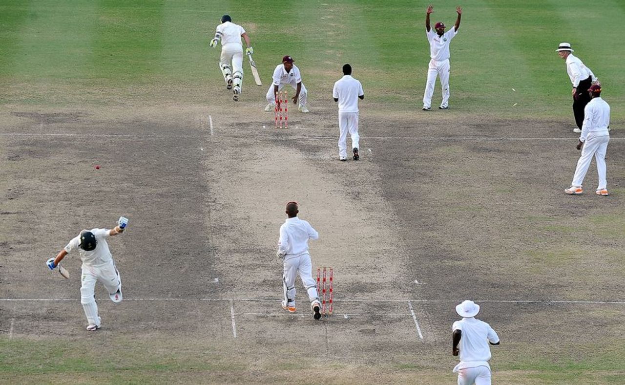 The Australians run through for their winning single, West Indies v Australia, 1st Test, Barbados, 5th day, April 11, 2012