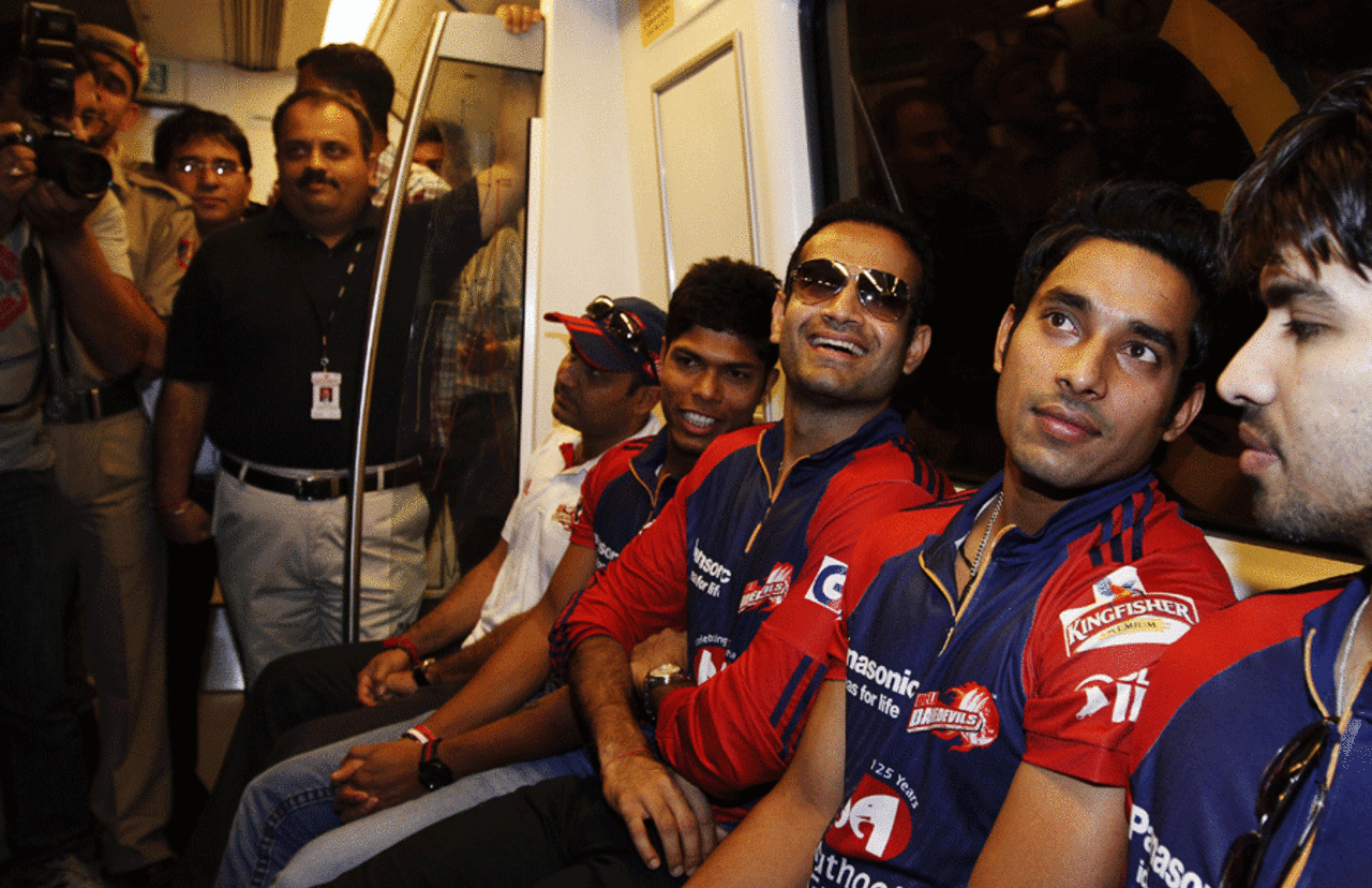 Virender Sehwag, Umesh Yadav, Irfan Pathan, Yogesh Nagar and Naman Ojha take a ride on the Delhi metro, April 13, 2012