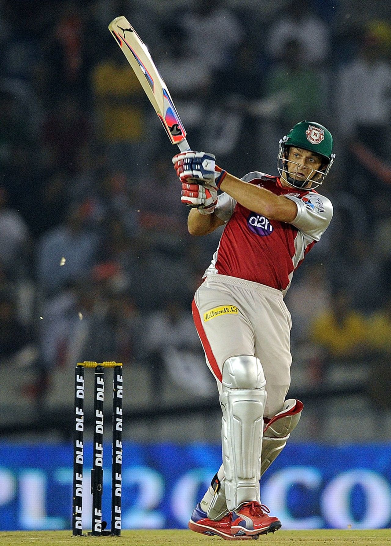Adam Gilchrist forces one through the on side, Kings XI Punjab v Kolkata Knight Riders, IPL, Mohali, April 18, 2012