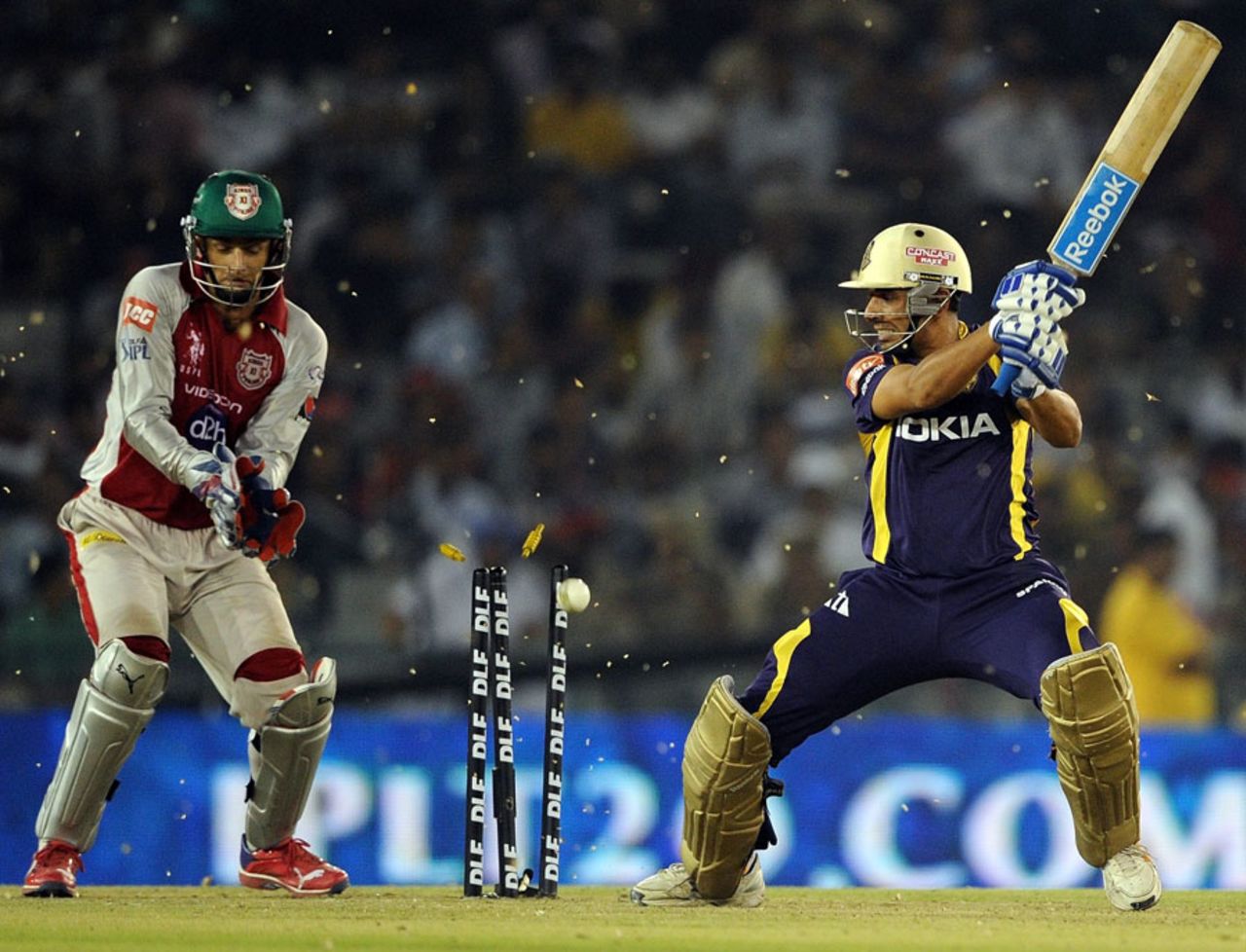Manvinder Bisla drags the ball onto his stumps, Kings XI Punjab v Kolkata Knight Riders, IPL, Mohali, April 18, 2012 