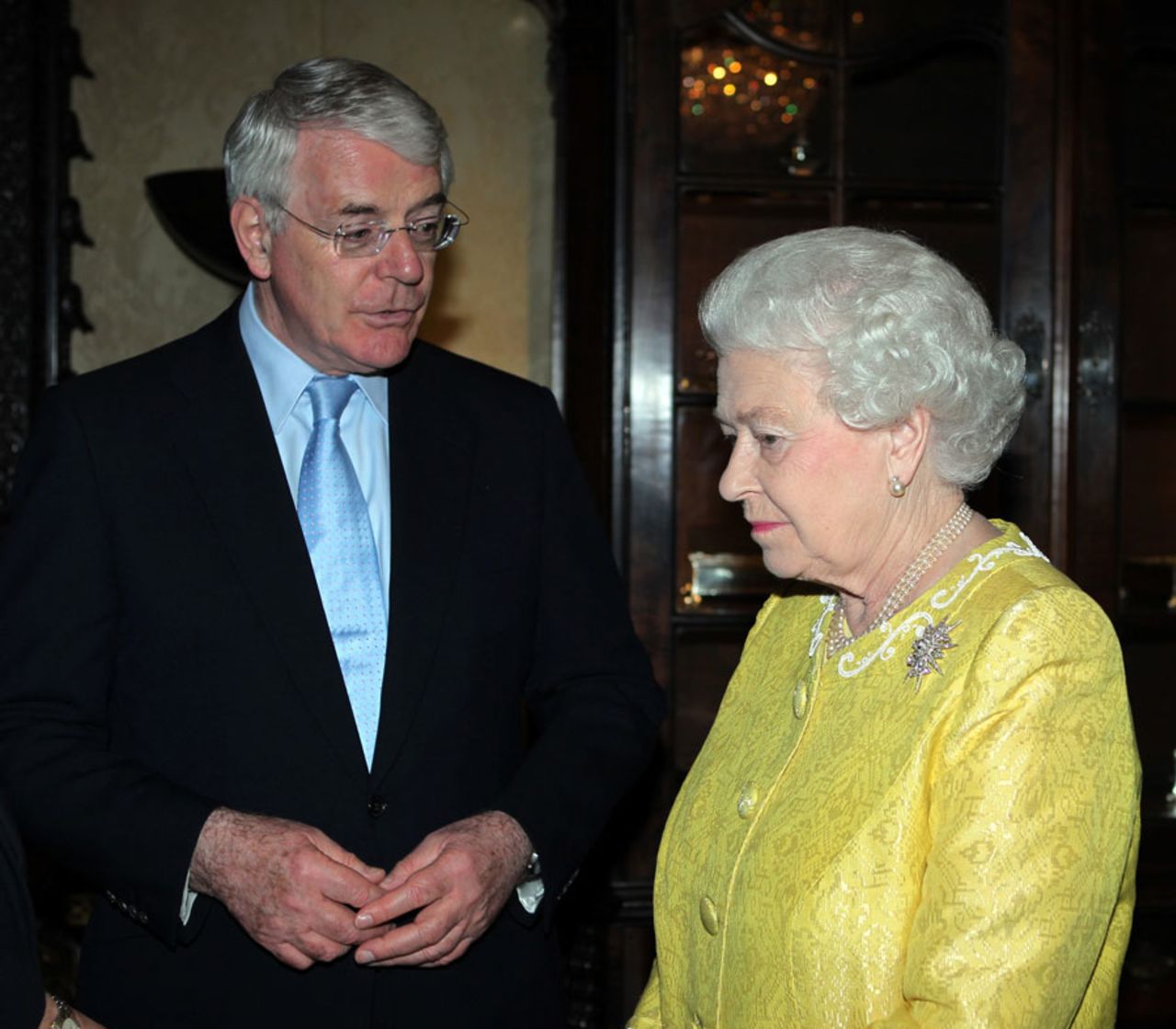 Queen Elizabeth II and former British Prime Minister John Major during a Commonwealth Day Reception at Marlborough House, London, March 12, 2012