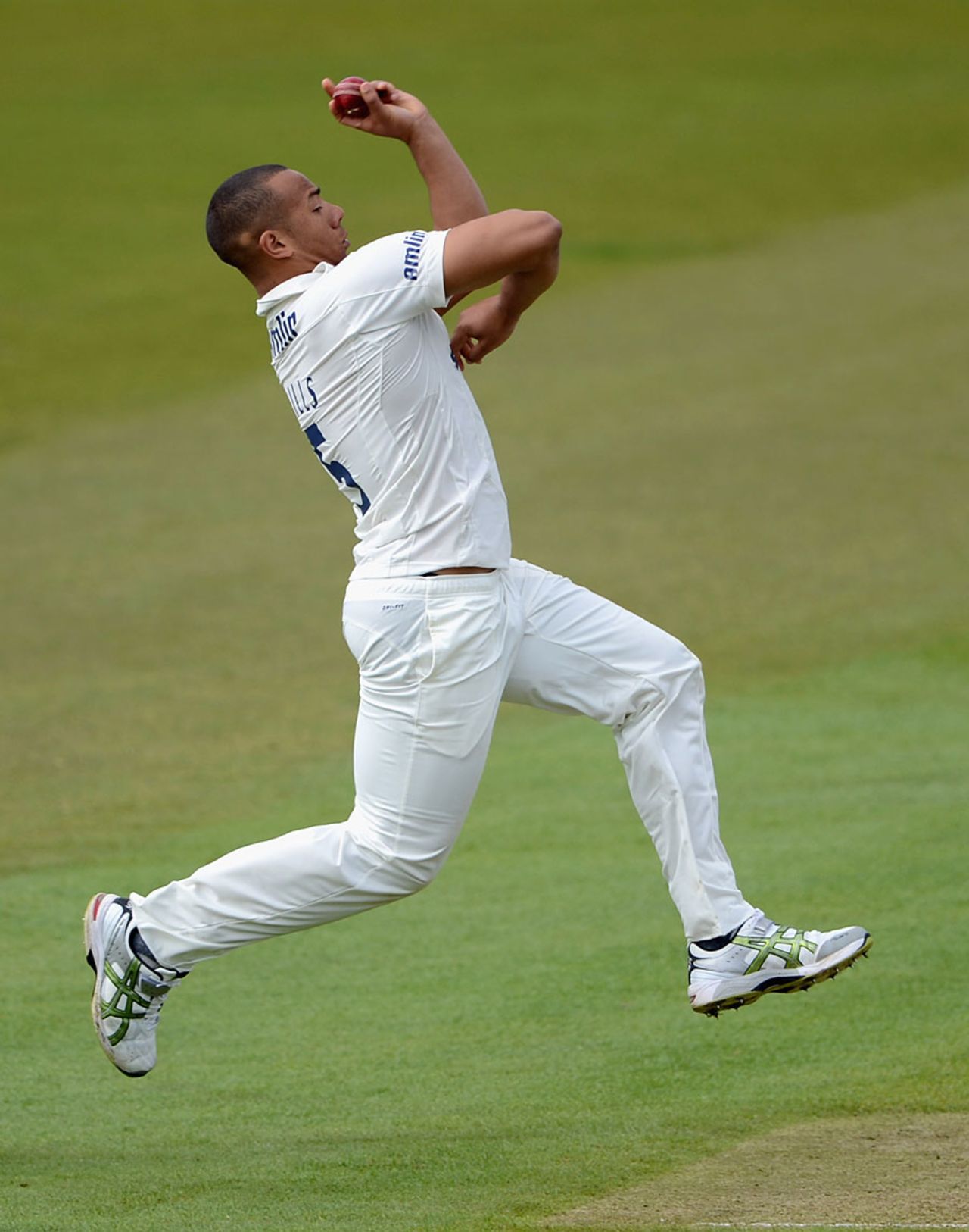 Tymal Mills gathers into his delivery stride, Yorkshire v Essex, County Championship, Division Two, Headingley, April 20, 2012