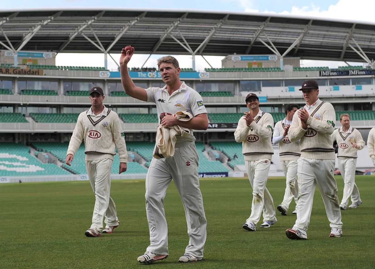 Stuart Meaker walks off to applause after his six-wicket haul, Surrey v Worcestershire, The Oval, 3rd day, April, 21, 2012