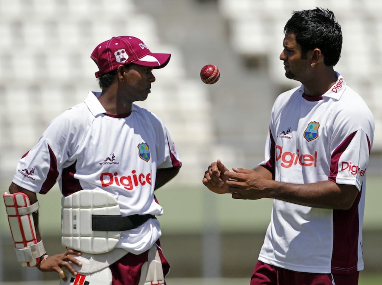 Shivnarine Chanderpaul chats with Assad Fudadin on the eve of the third Test against Australia, Roseau, Dominica, April 22, 2012
