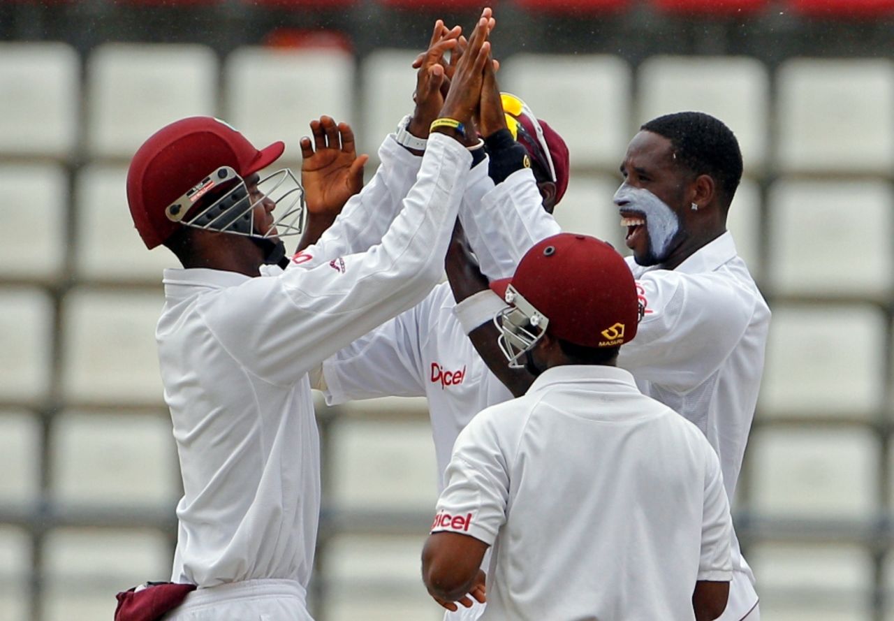 Shane Shillingford celebrates after picking up his tenth wicket of the match, West Indies v Australia, 3rd Test, Roseau, 4th day, April 26, 2012