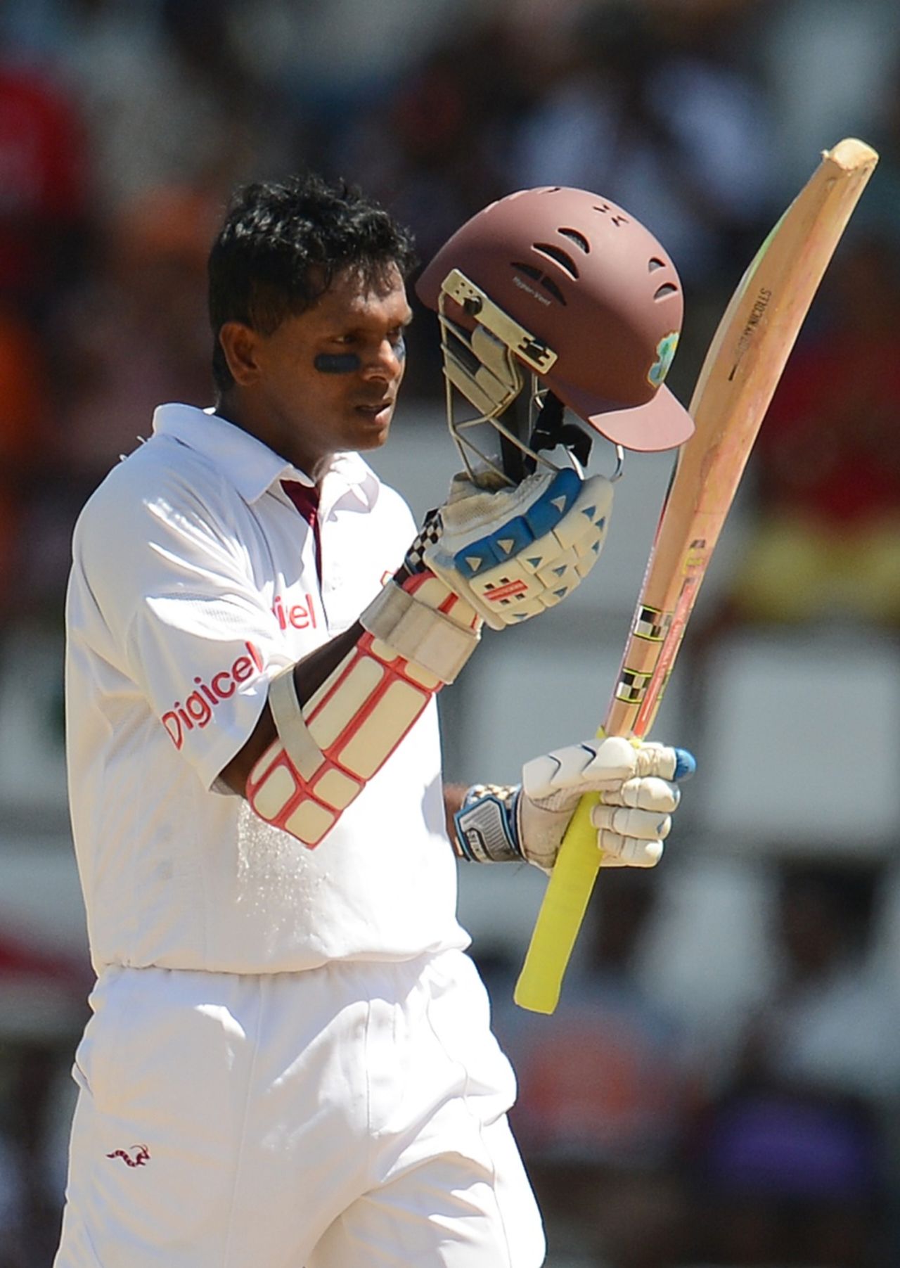 Shivnarine Chanderpaul acknowledges the applause after scoring his 10,000th Test run, West Indies v Australia, 3rd Test, Roseau, 4th day, April 26, 2012