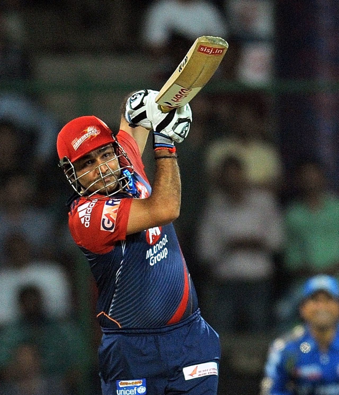 Virender Sehwag launches the ball over the bowler's head, Delhi Daredevils v Mumbai Indians, IPL, Delhi, April 27, 2012