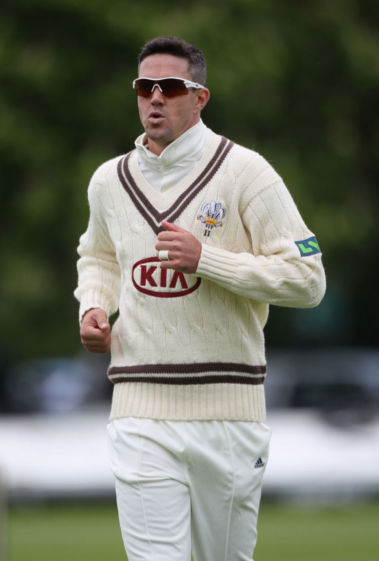 Kevin Pietersen wrapped up warm whilst in the field, Worcestershire v Surrey, County Championship, Division One, 1st day, New Road, May 9, 2012