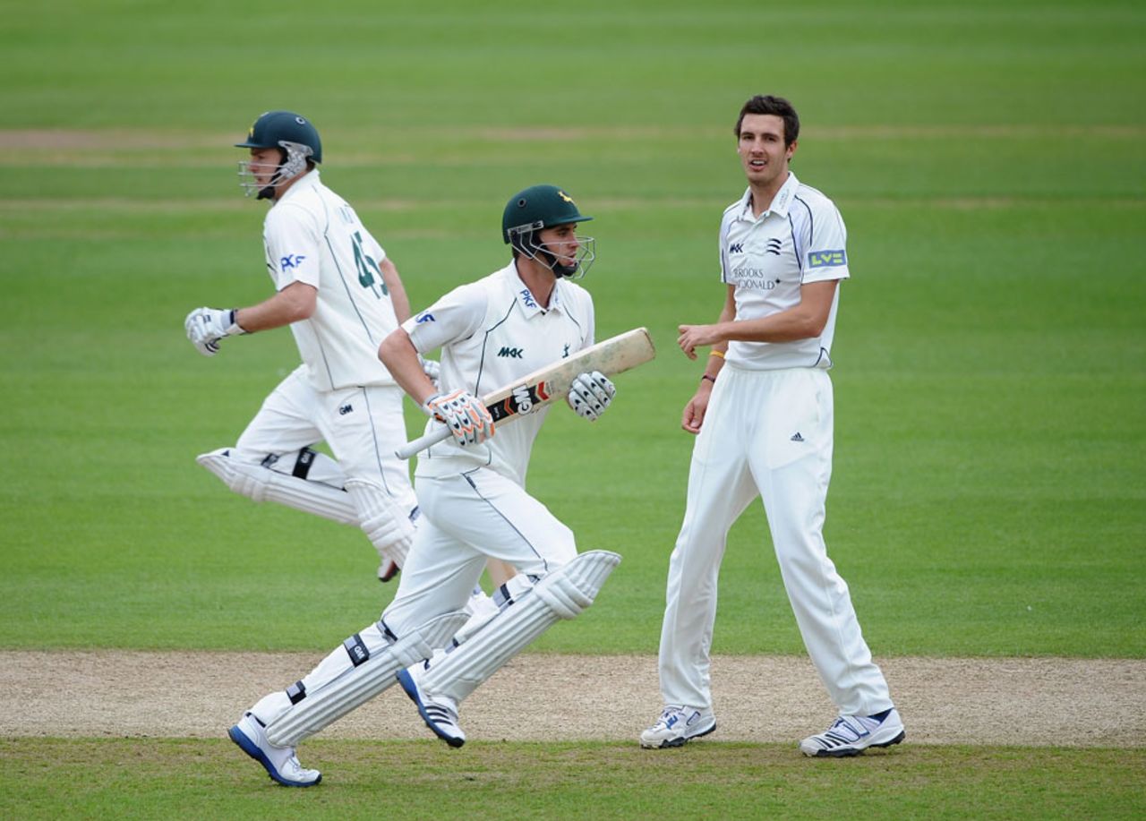 Michael Lumb and Alex Hales run between the wickets at Steven Finn looks on, Nottinghamshire v Middlesex, County Championship, Division One, 1st day, Trent Bridge, May 9, 2012