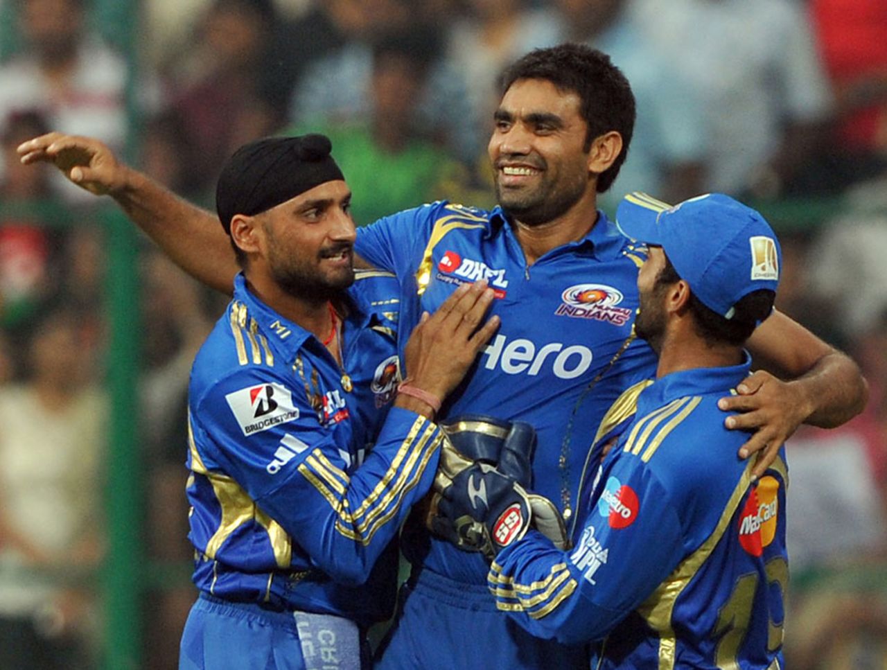 Munaf Patel is all smiles after dismissing Chris Gayle cheaply, Royal Challengers Bangalore v Mumbai Indians, IPL, Bangalore, May 14, 2012