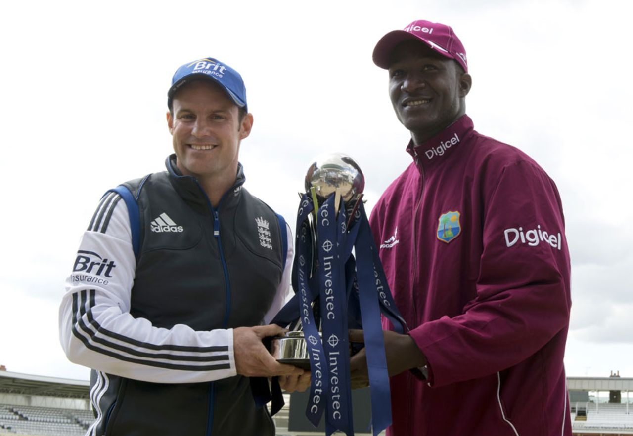 Captains Andrew Strauss and Darren Sammy pose with the series trophy ahead of the first Test between England and West Indies, Lord's, May 16, 2012