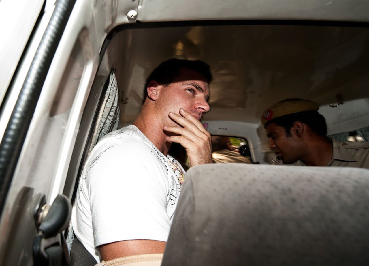 Luke Pomersbach in the back of a police jeep, Delhi, May 18, 2012