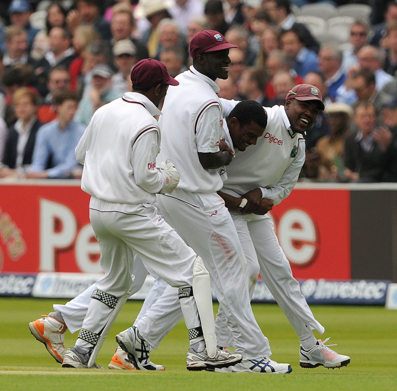 Shannon Gabriel gets mobbed by his team-mates, England v West Indies, 1st Test, Lord's, 3rd day, May 19, 2012
