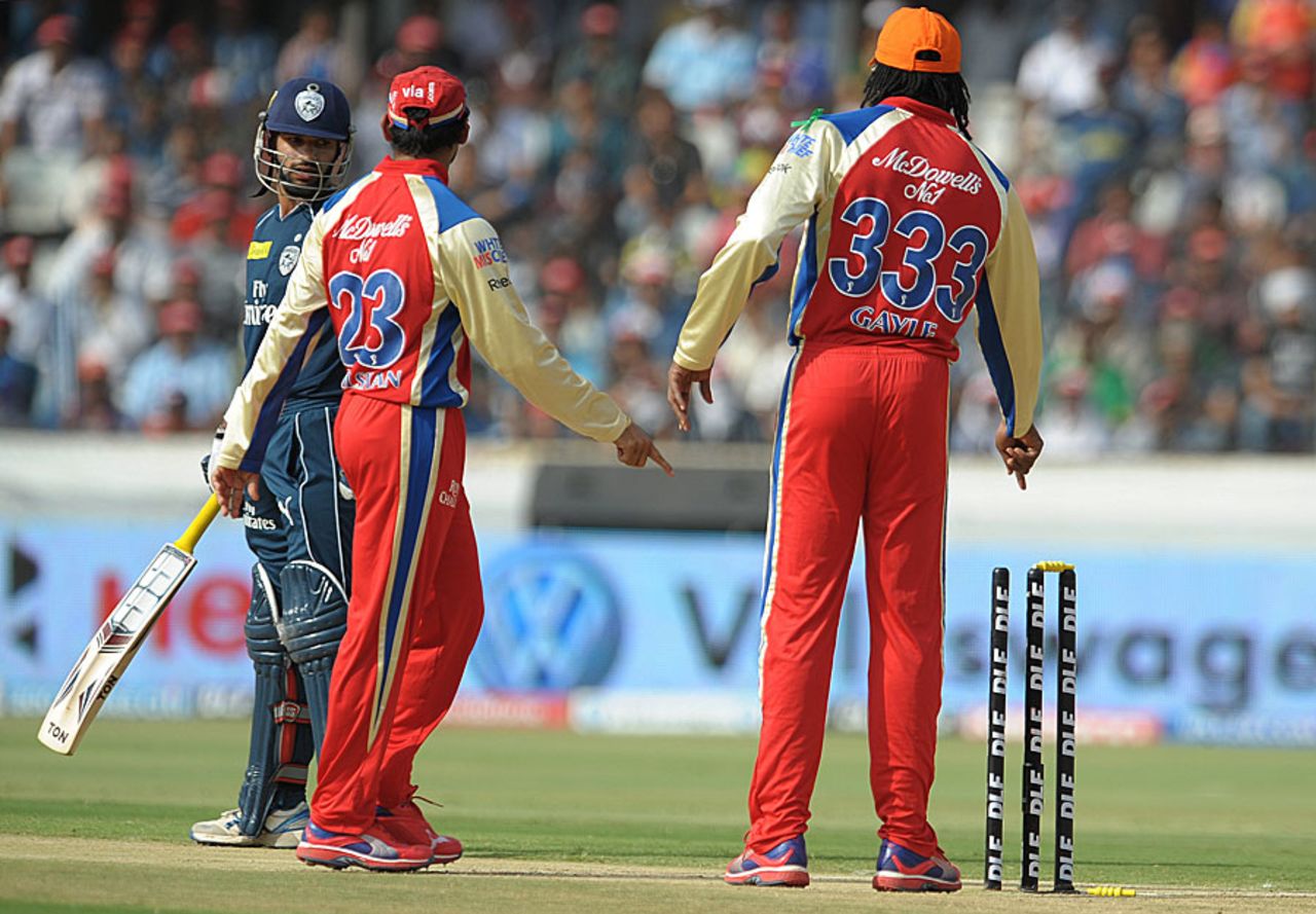 Chris Gayle indicates to the umpire that Shikhar Dhawan was indeed bowled, Deccan Chargers v Royal Challengers Bangalore, IPL, Hyderabad, May 20, 2012