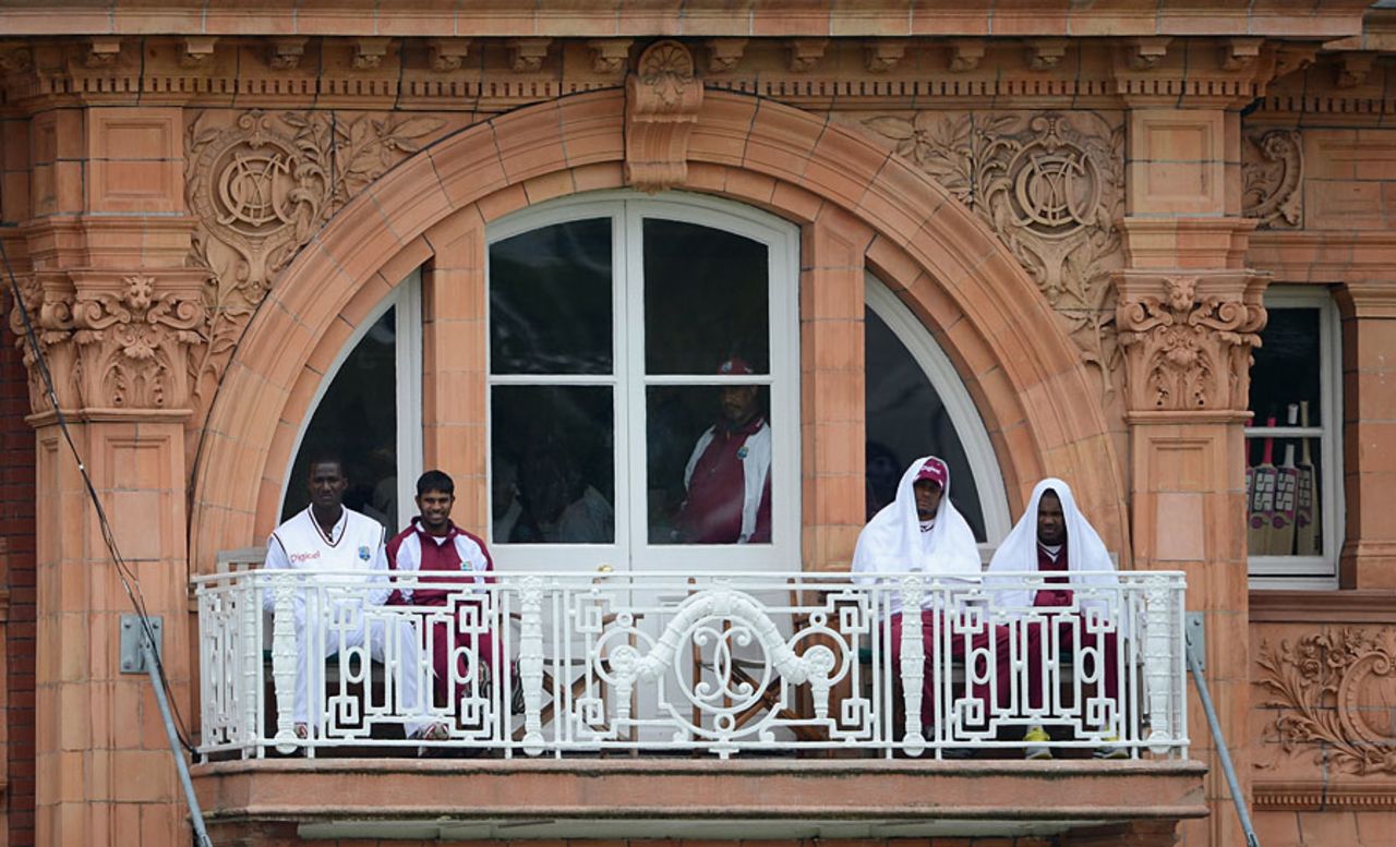 West Indies players huddle up against the cold, England v West Indies, 1st Test, Lord's, 4th day, May 20, 2012