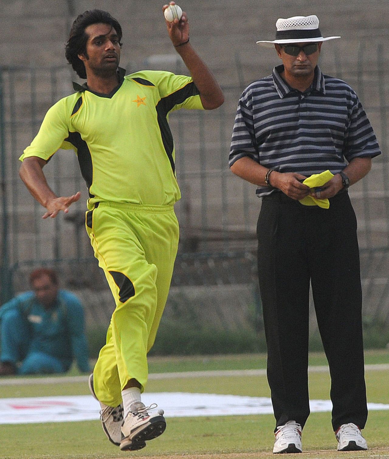 Rahat Ali bowls during a practice match, Lahore, May 20, 2012