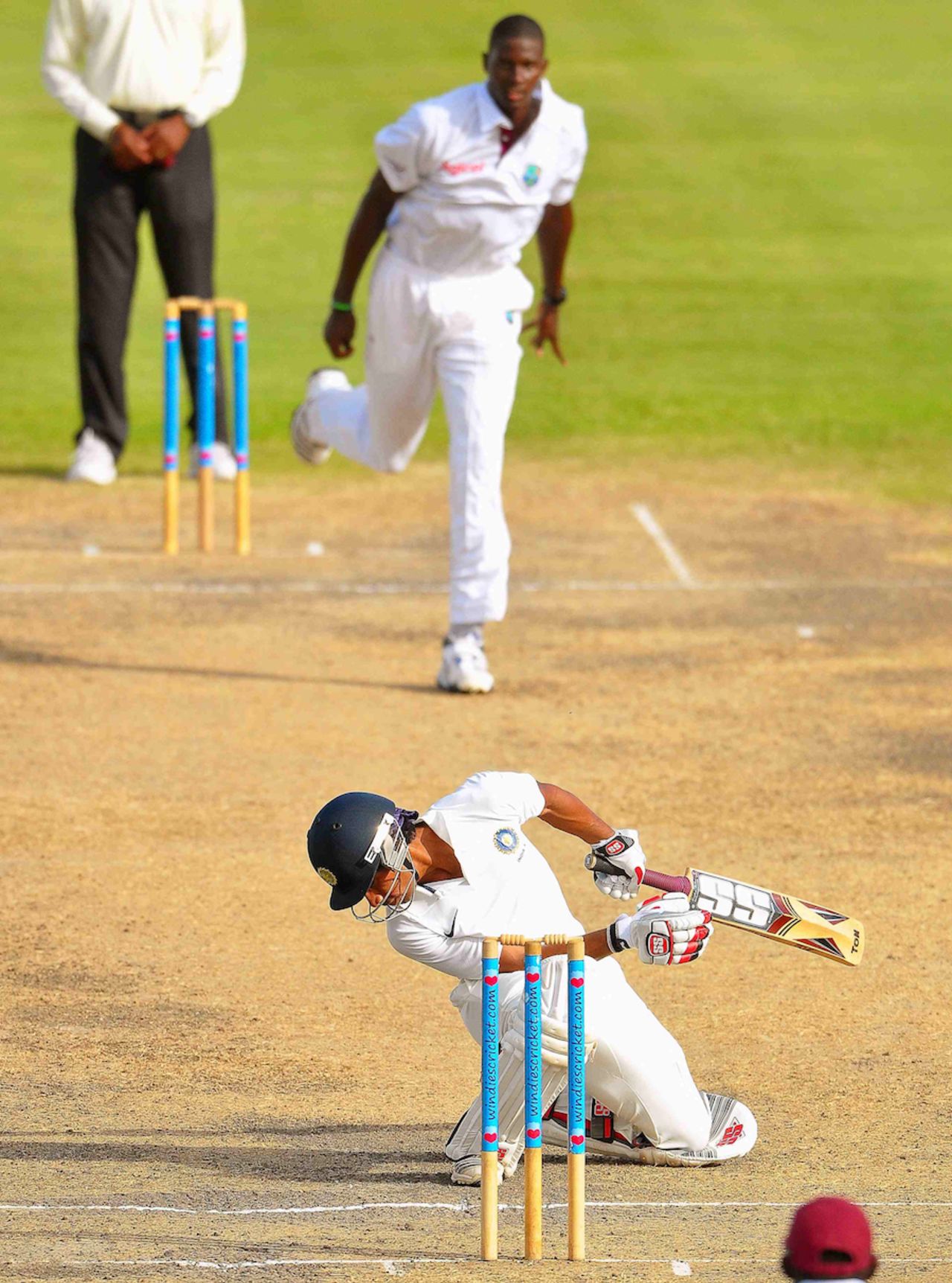 Wriddhiman Saha ducks under a Jason Holder bouncer, West Indies A v India A, 1st unofficial Test, Barbados, 2nd day, June 3, 2012