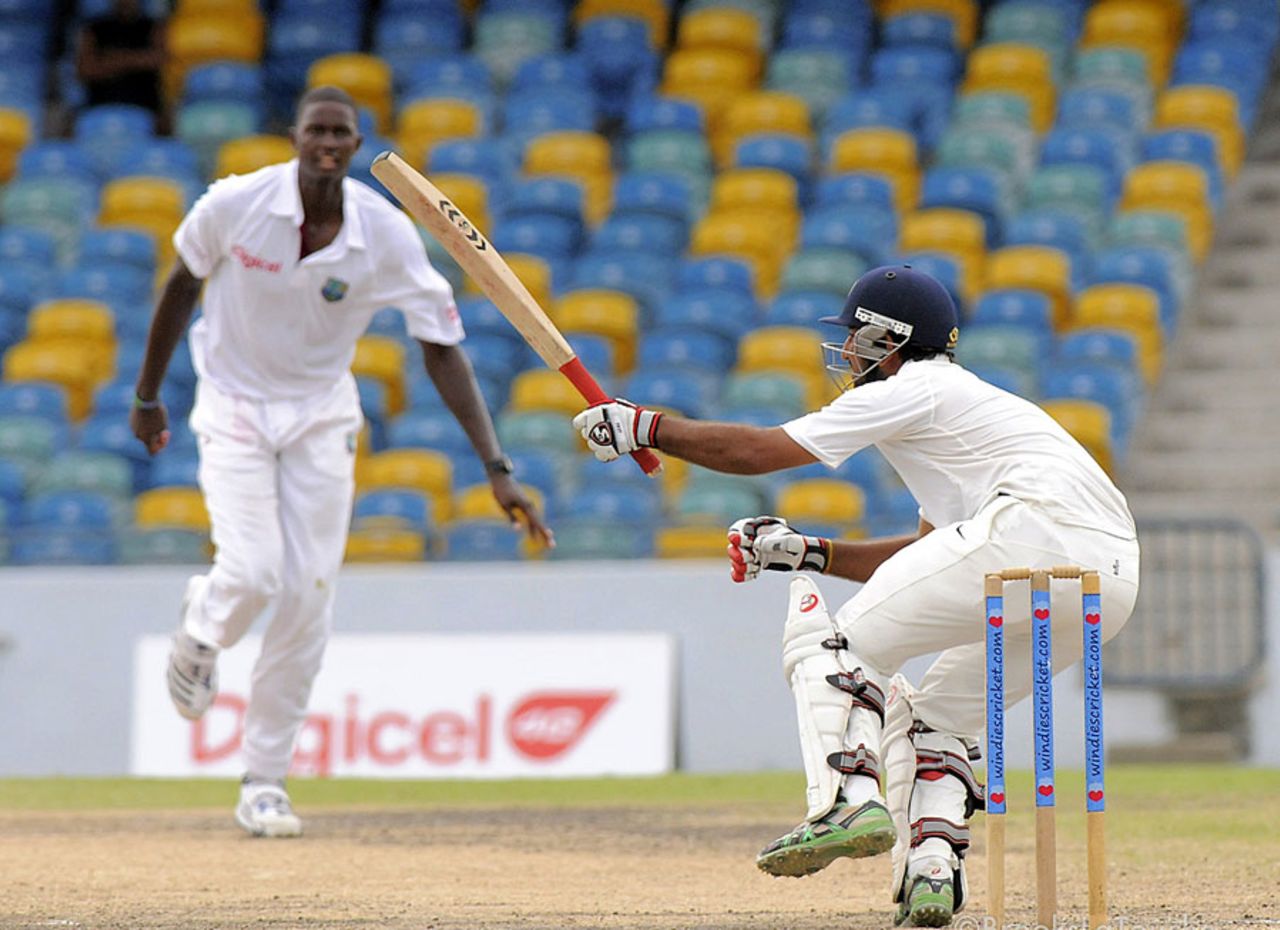 Cheteshwar Pujara is struck by a Jason Holder delivery, West Indies A v India A, 1st unofficial Test, Barbados, 4th day, June 5, 2012