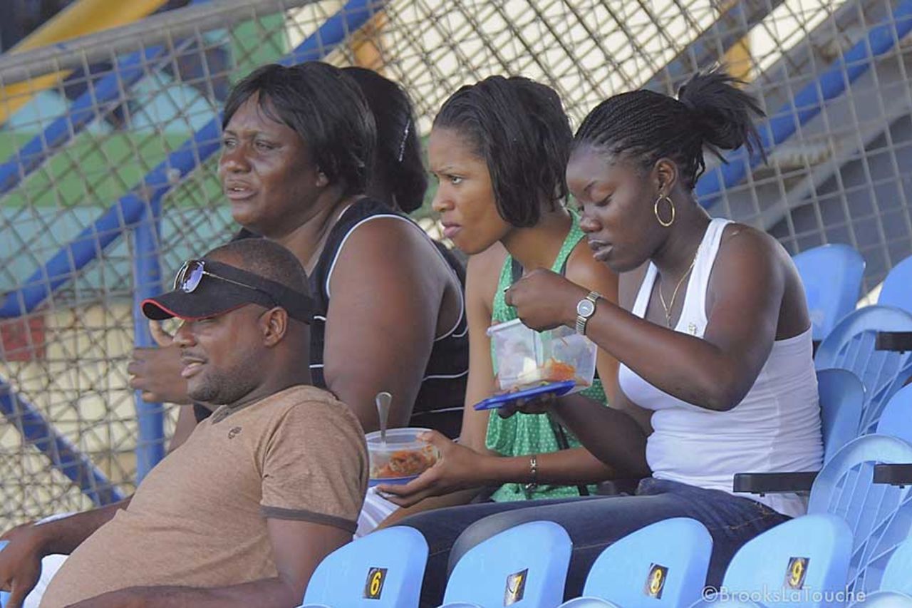 Spectators grab some lunch during the game, West Indies A v India A, 2nd unofficial Test, St Vincent, 2nd day, June 10, 2012