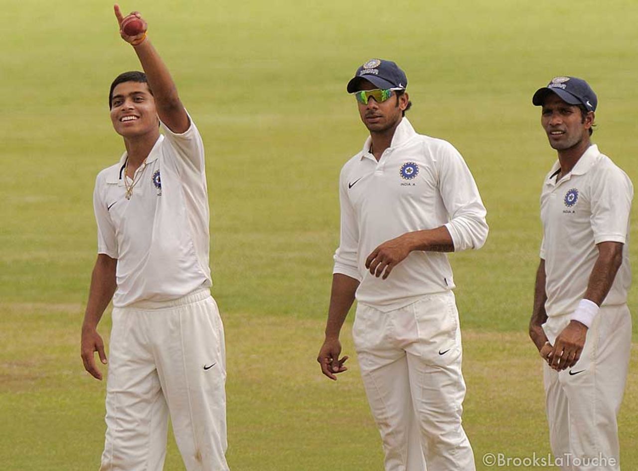 Akshay Darekar celebrates his haul as Manoj Tiwary and Ashok Dinda look on, West Indies A v India A, 2nd unofficial Test, St Vincent, 3rd day, June 11, 2012