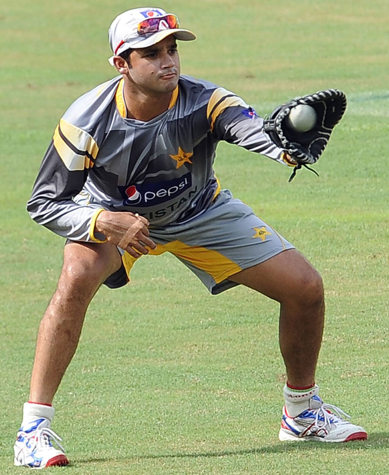 Azhar Ali takes a catch during a training session, Colombo, June 15, 2012