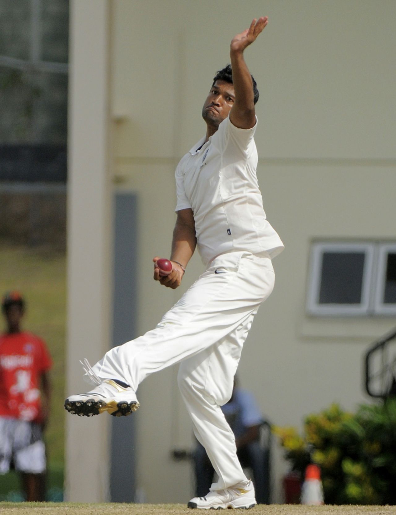 India A's Jalaj Saxena in delivery stride, West Indies A v India A, 3rd unofficial Test, St Lucia, 2nd day, June 17, 2012