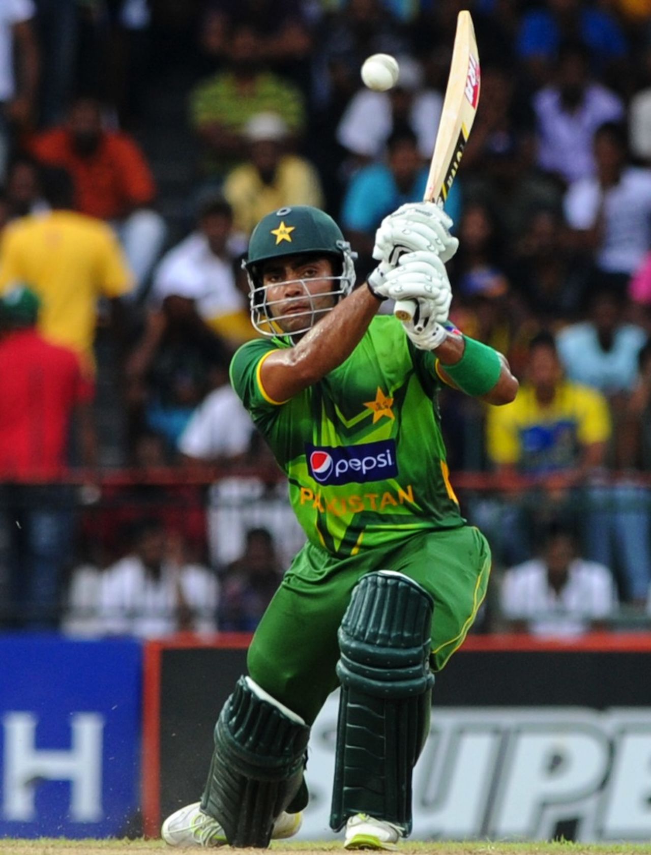 Umar Akmal hits down the ground, Sri Lanka v Pakistan, 5th ODI, Premadasa Stadium, Colombo, June 18, 2012
