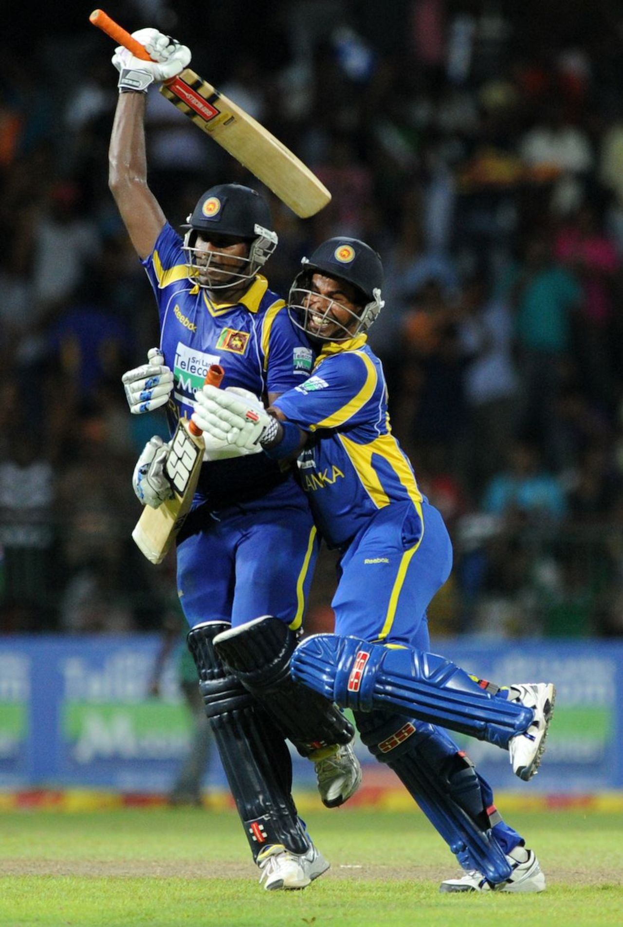 Angelo Mathews and Nuwan Kulasekara celebrate a hard-fought victory, Sri Lanka v Pakistan, 5th ODI, Premadasa Stadium, Colombo, June 18, 2012