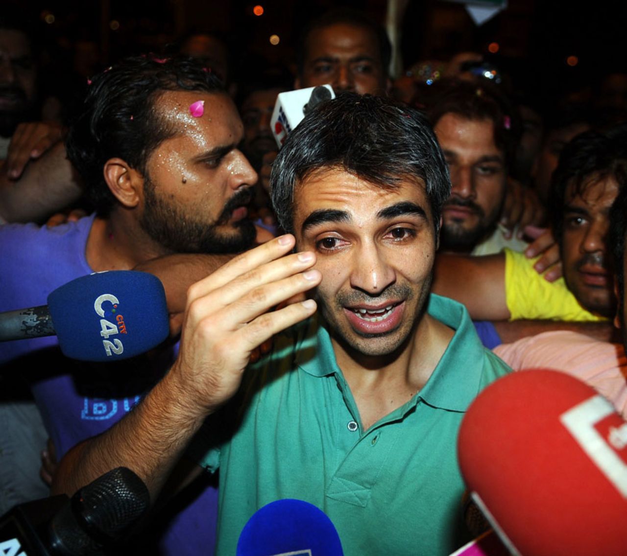 Salman Butt speaks to the media at Lahore airport, June 22, 2012