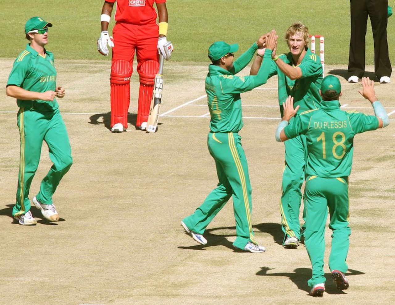 Chris Morris is congratulated by his team-mates, Zimbabwe v South Africa, T20 tri-series, Harare, June 23, 2012