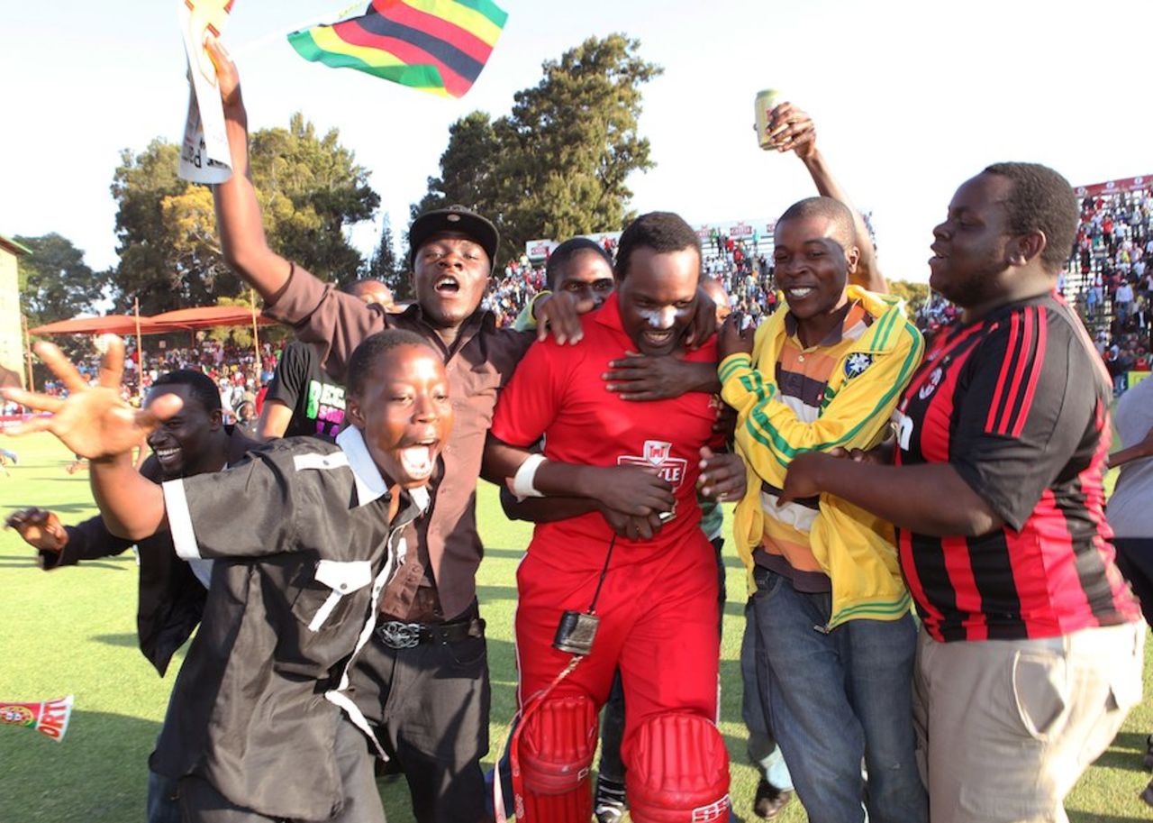 Hamilton Masakadza is congratulated by happy Zimbabwe fans, Zimbabwe v South Africa, T20 tri-series final, Harare, June 24, 2012