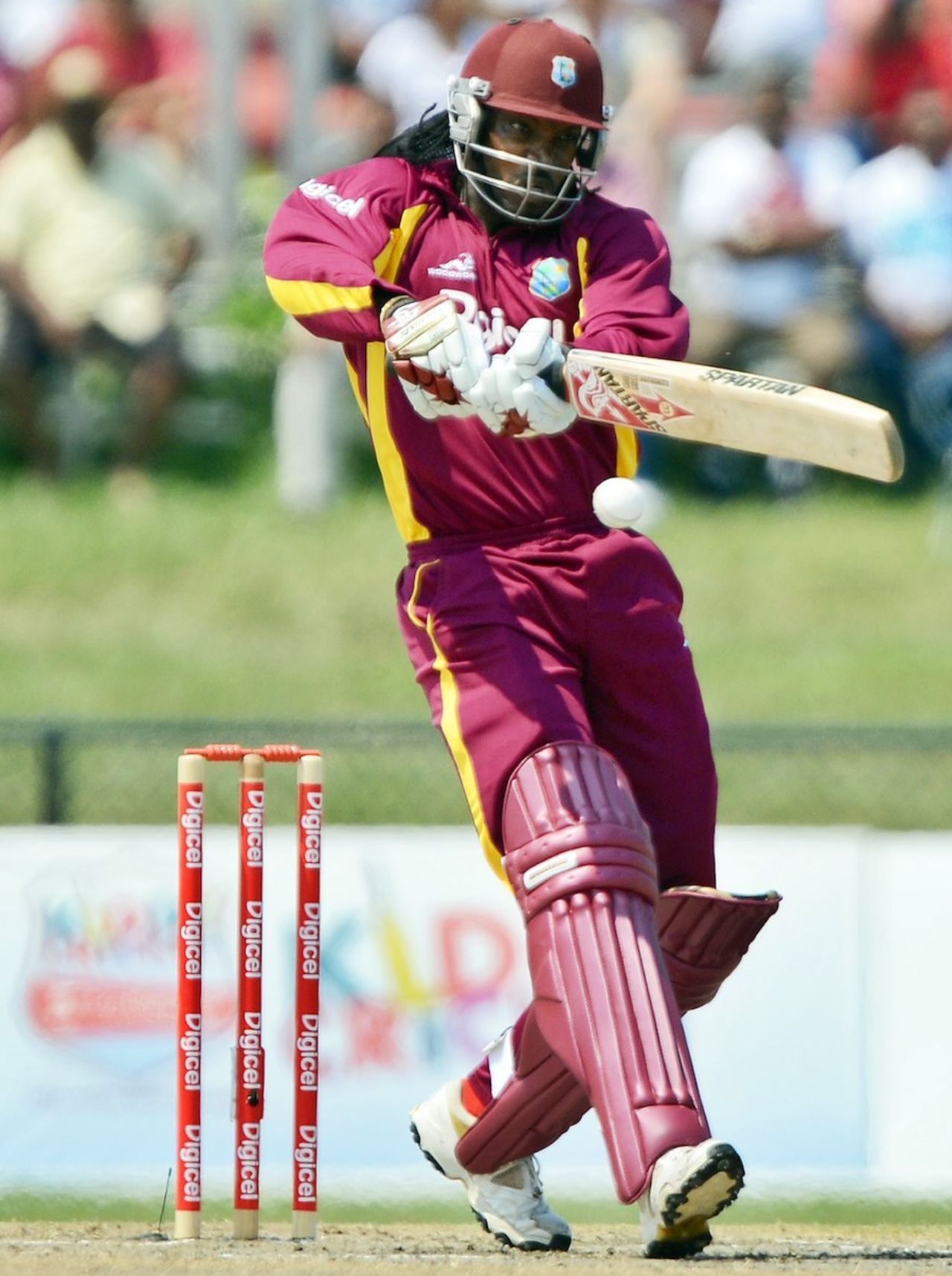 Chris Gayle attacked after a watchful start , West Indies v New Zealand, 1st Twenty20, Florida, June 30, 2012